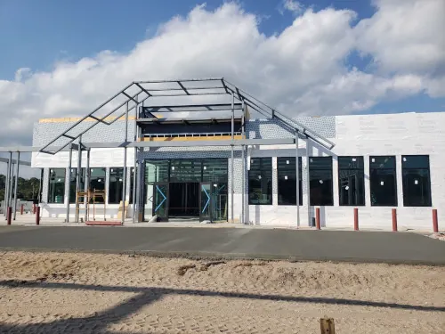 Commercial storefront framing and glass installed during construction