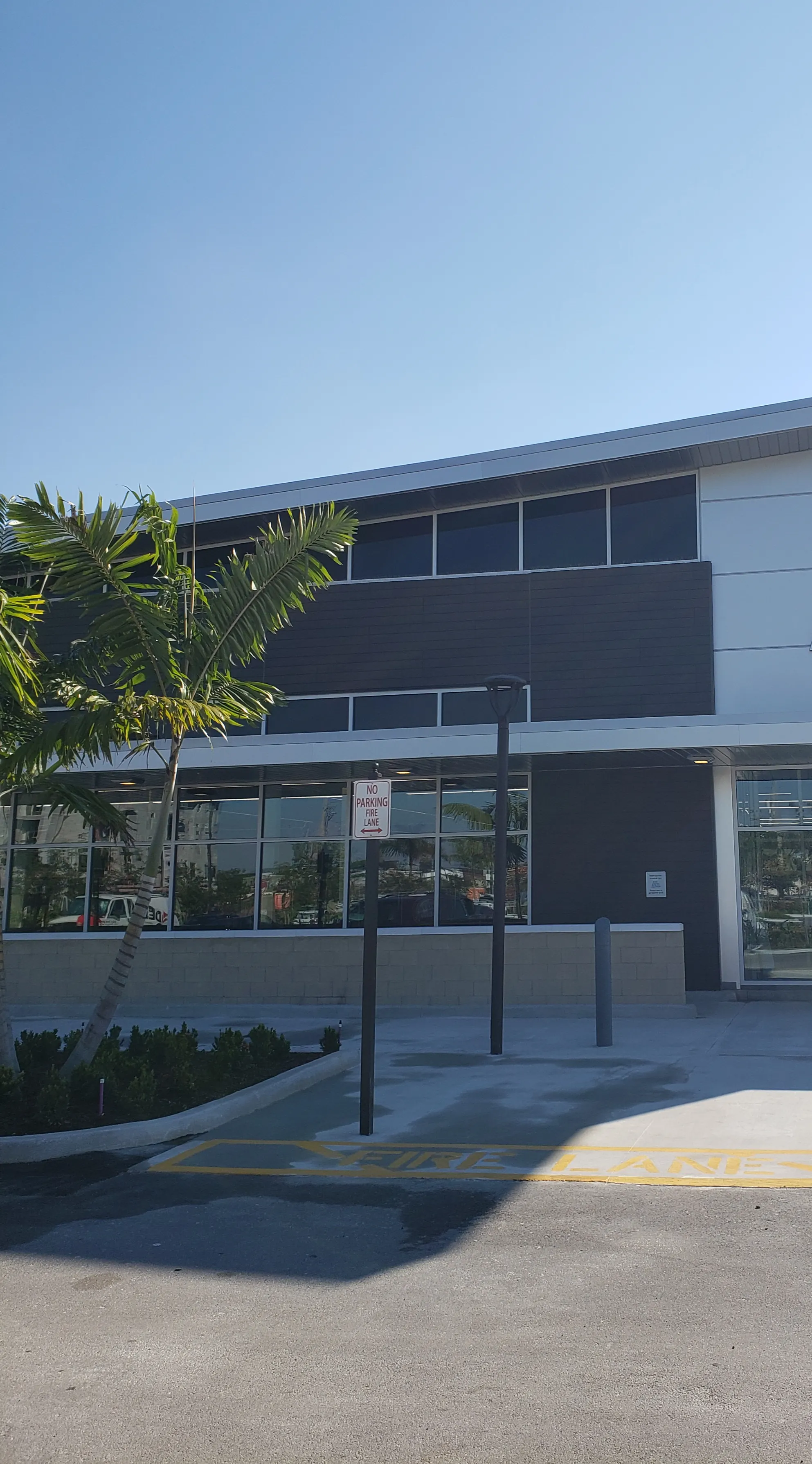 Two-story commercial building with aluminum window systems