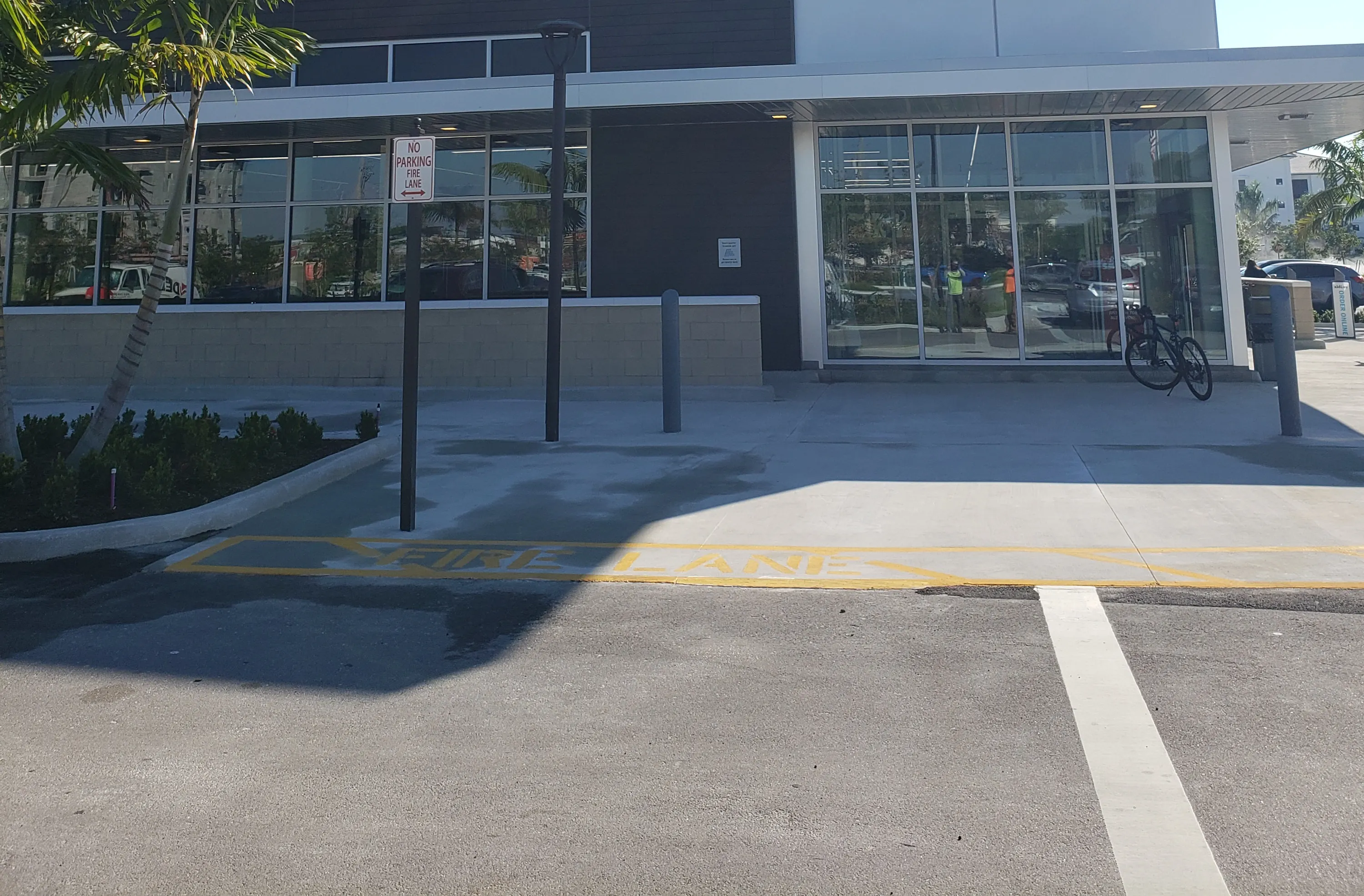 Wide commercial storefront window and entrance installation
